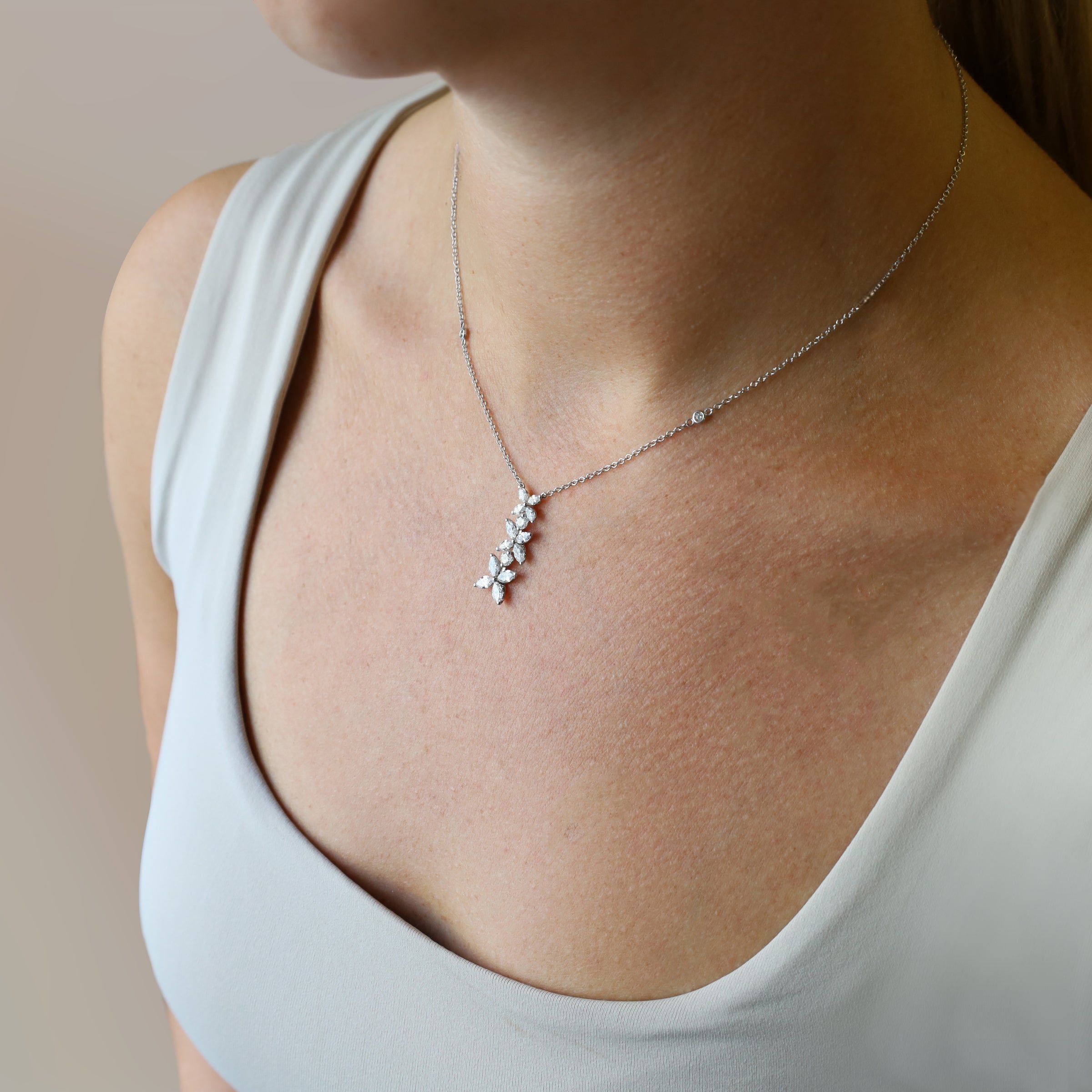 Three tiered 'Kisses' Necklace featuring 12 marquise cut diamonds on white gold chain