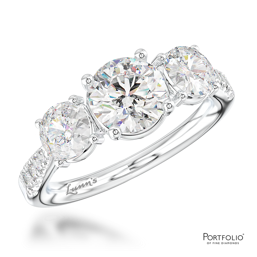 Three Stone 0.70ct E SI1 Diamond Platinum Ring