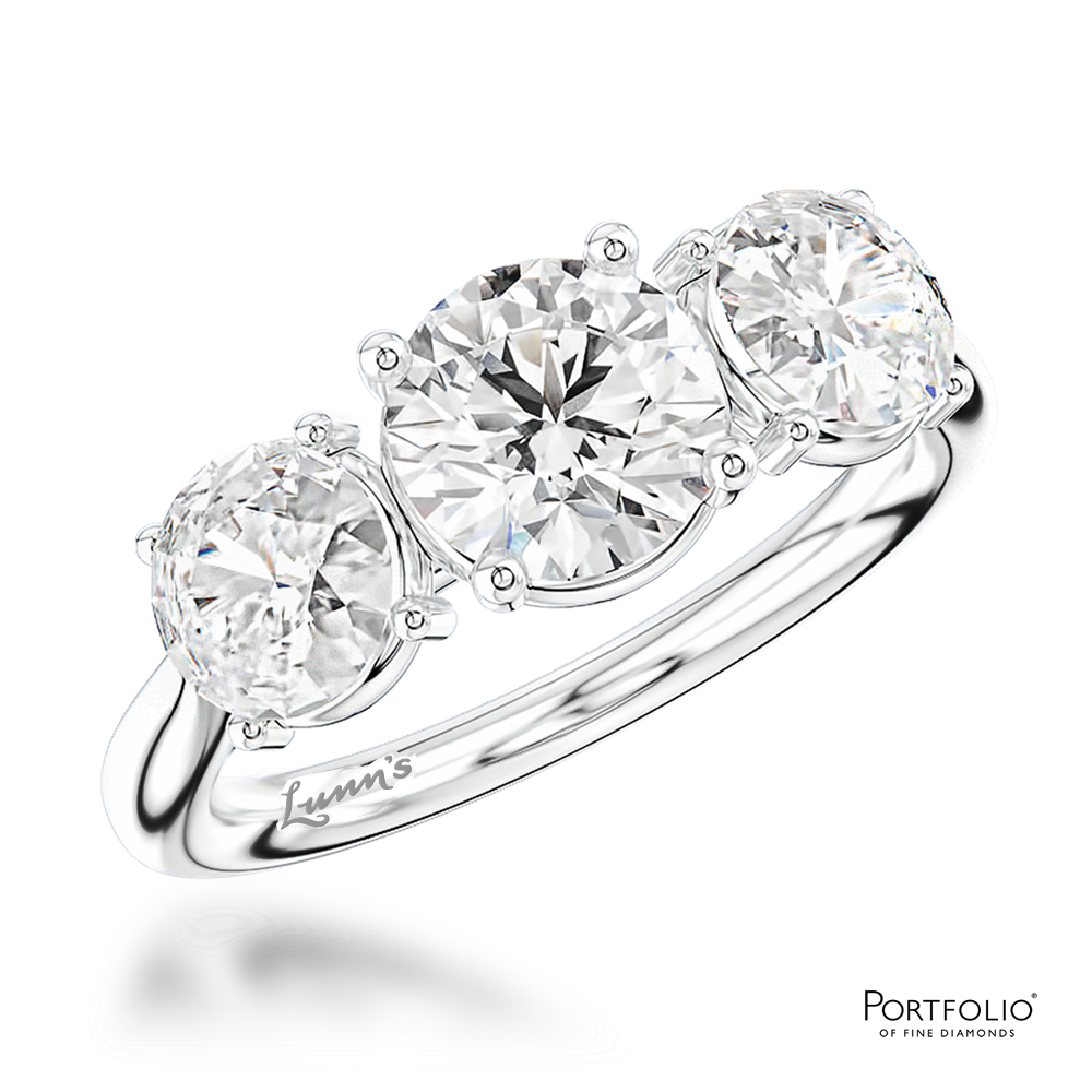 Three Stone 0.70ct E SI1 Diamond Platinum Ring