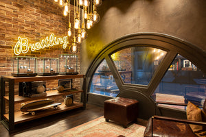 Upstairs of the Breitling Boutique with classic arcade architecture and antique window